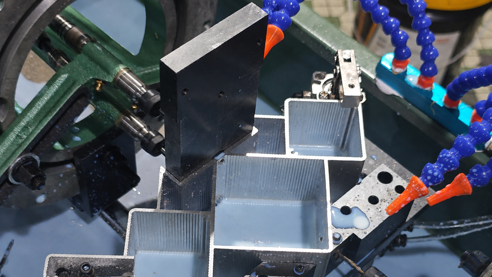 Multi-axis drilling and tapping of hollow aluminum profiles used to illustrate the need to qualify each cutting zone and internal breakthrough