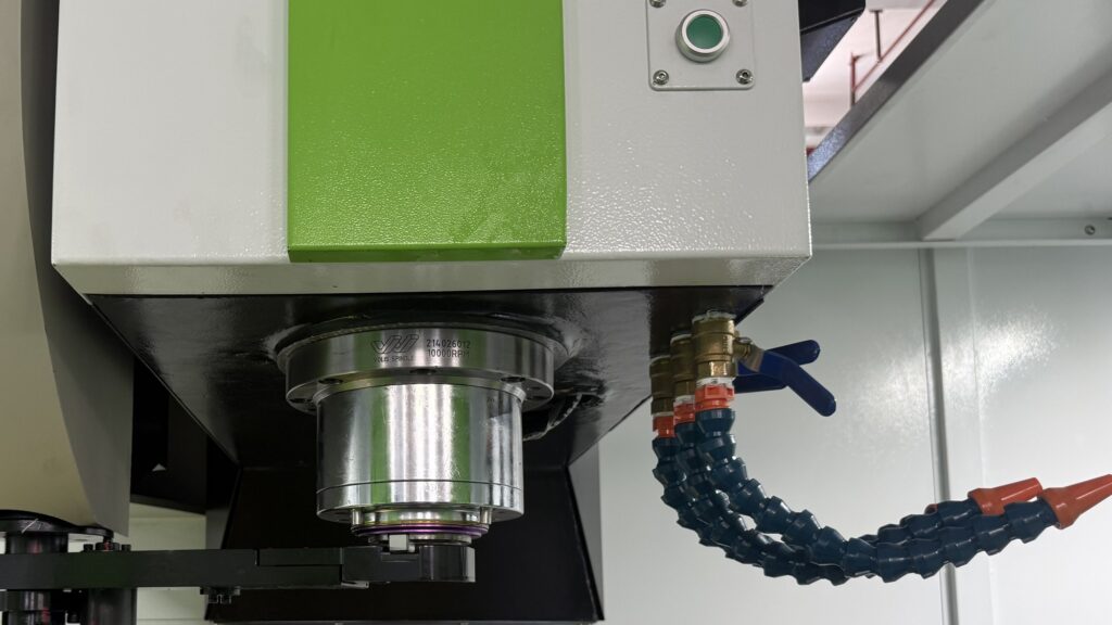 The spindle and tool-change arm of a Chansin CS-L1380 vertical machining center