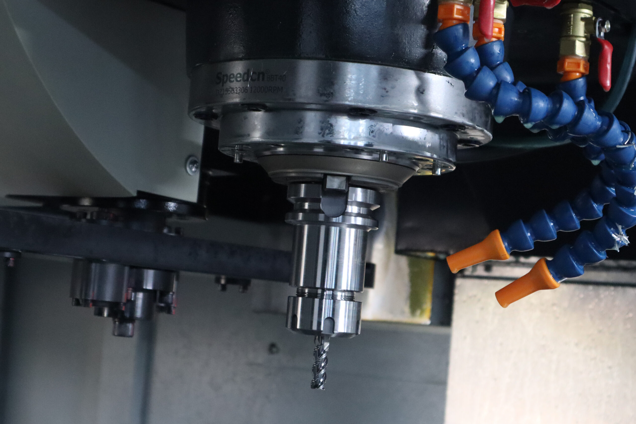 A milling tool extending from a spindle-mounted holder